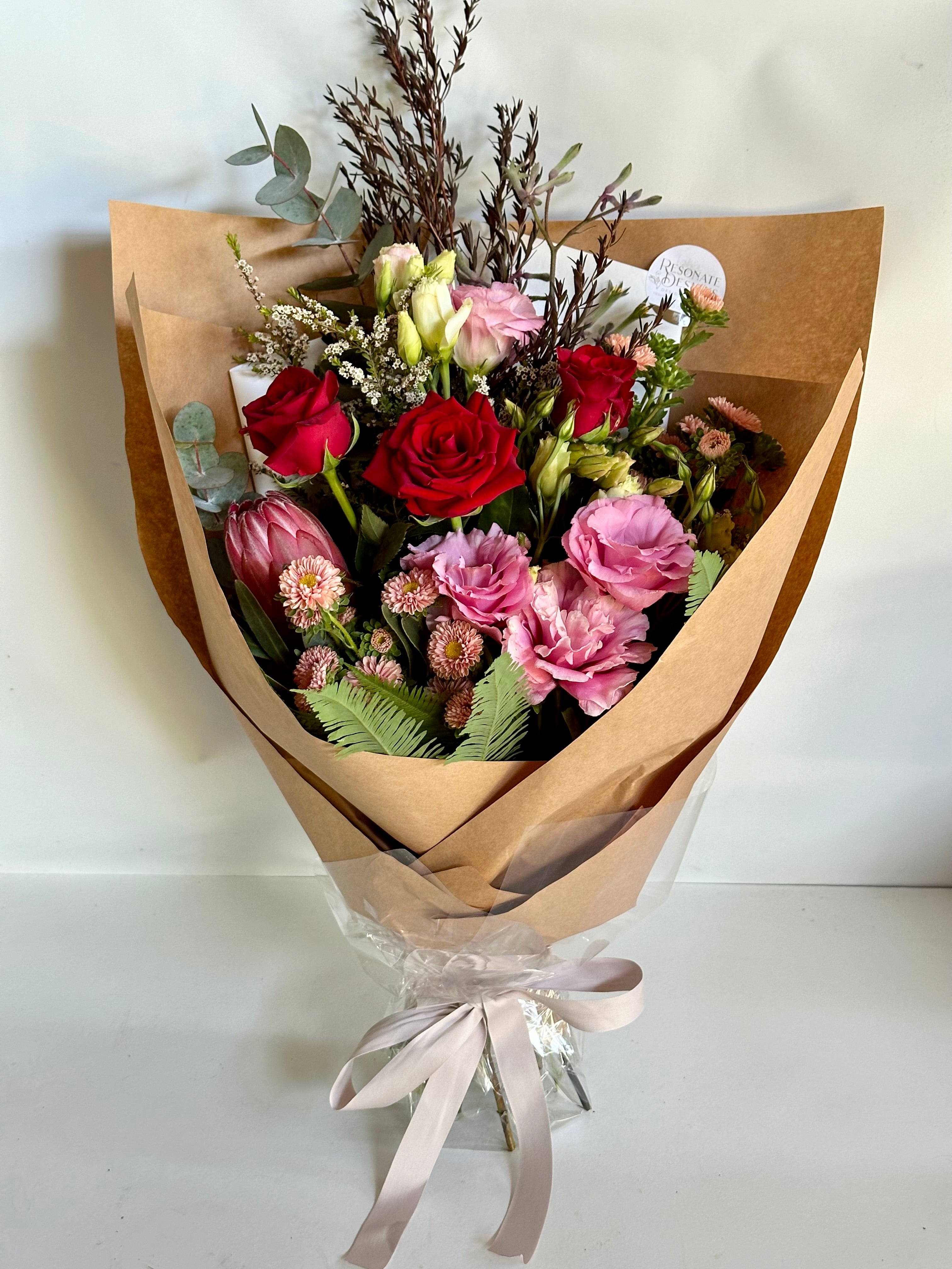 Flower Bouquet with Red roses, Peach aster and Pink Lisianthus for delivery on the Sunshine Coast by Resonate Designs Florist