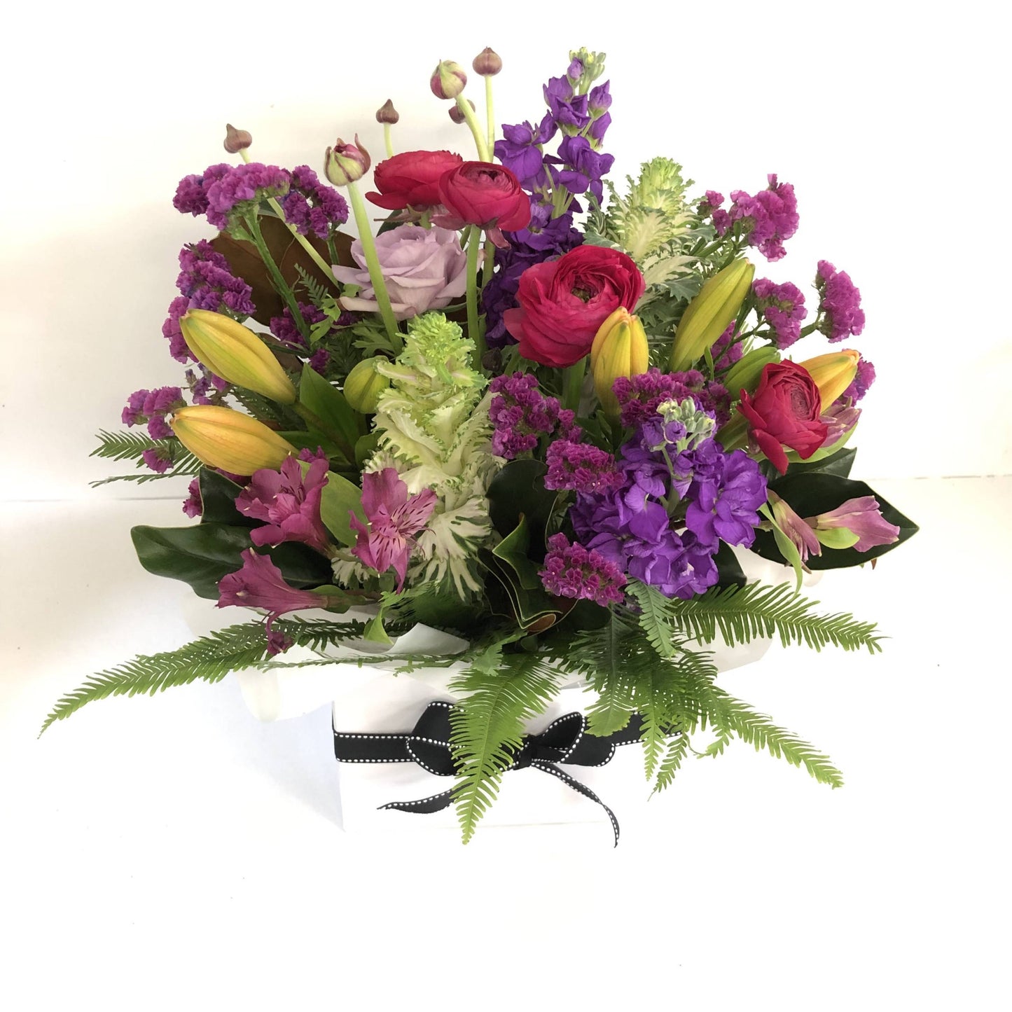 Box of flowers in bright colors for delivery on the Sunshine Coast