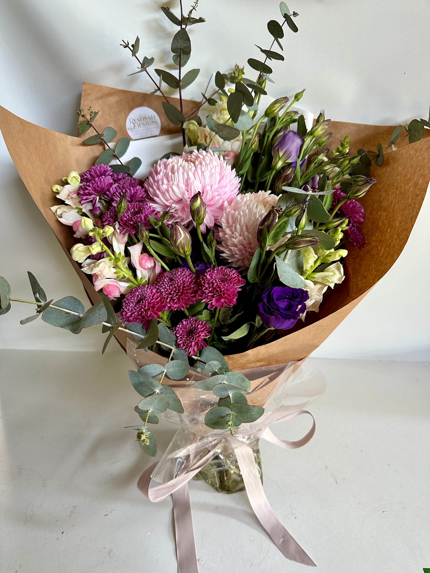 pink and purple bunch of flowers Gift wrapped for delivery on the sunshine coast