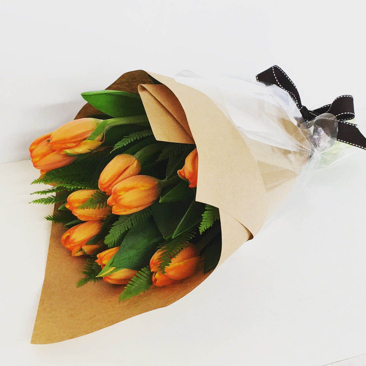 orange tulips gift wrapped for delivery on the sunshine coast