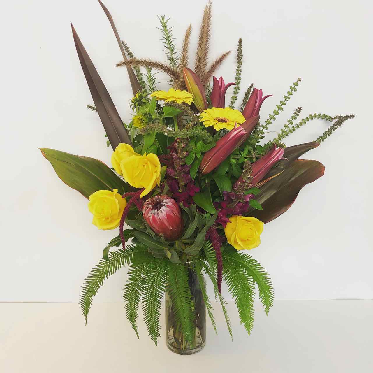 Locally grown flowers, herbs and greenery in a vase delivered on the Sunshine Coast