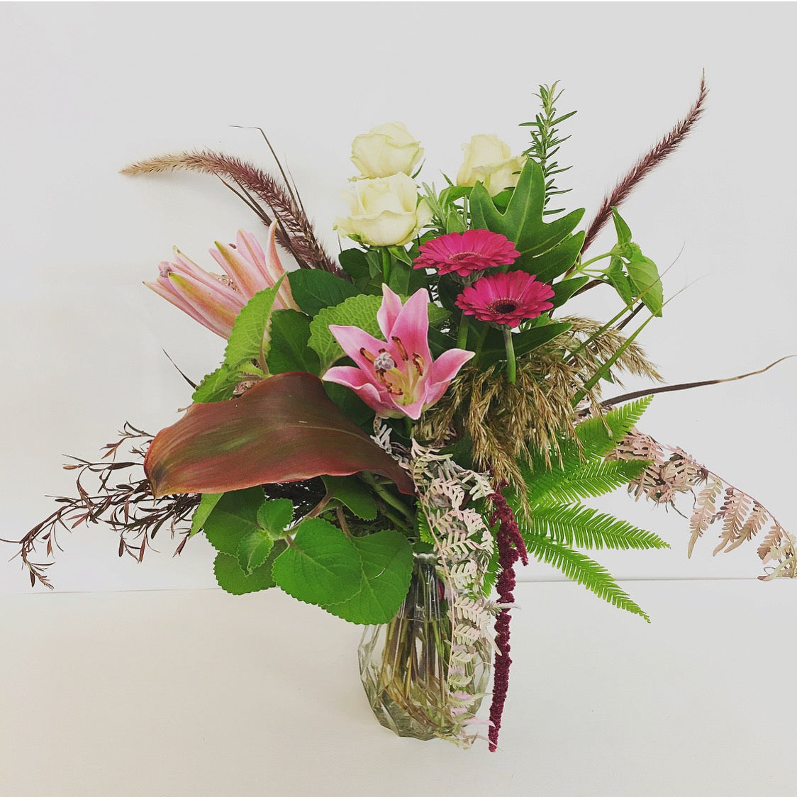 locally grown flowers, herbs, and greenery  in a vase for delivery on the sunshine coast