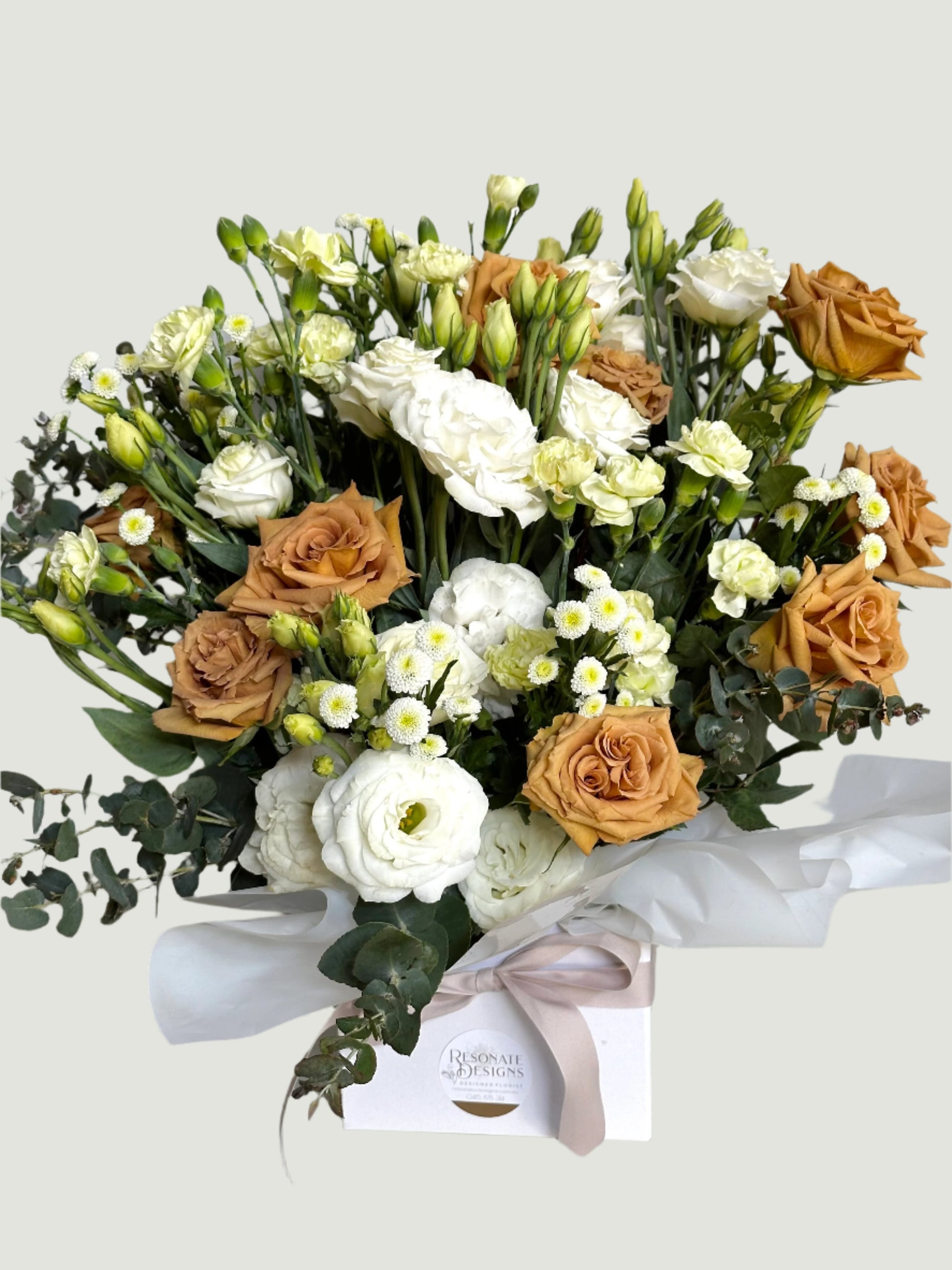 Box of flowers in soft tones for delivery on the Sunshine Coast  