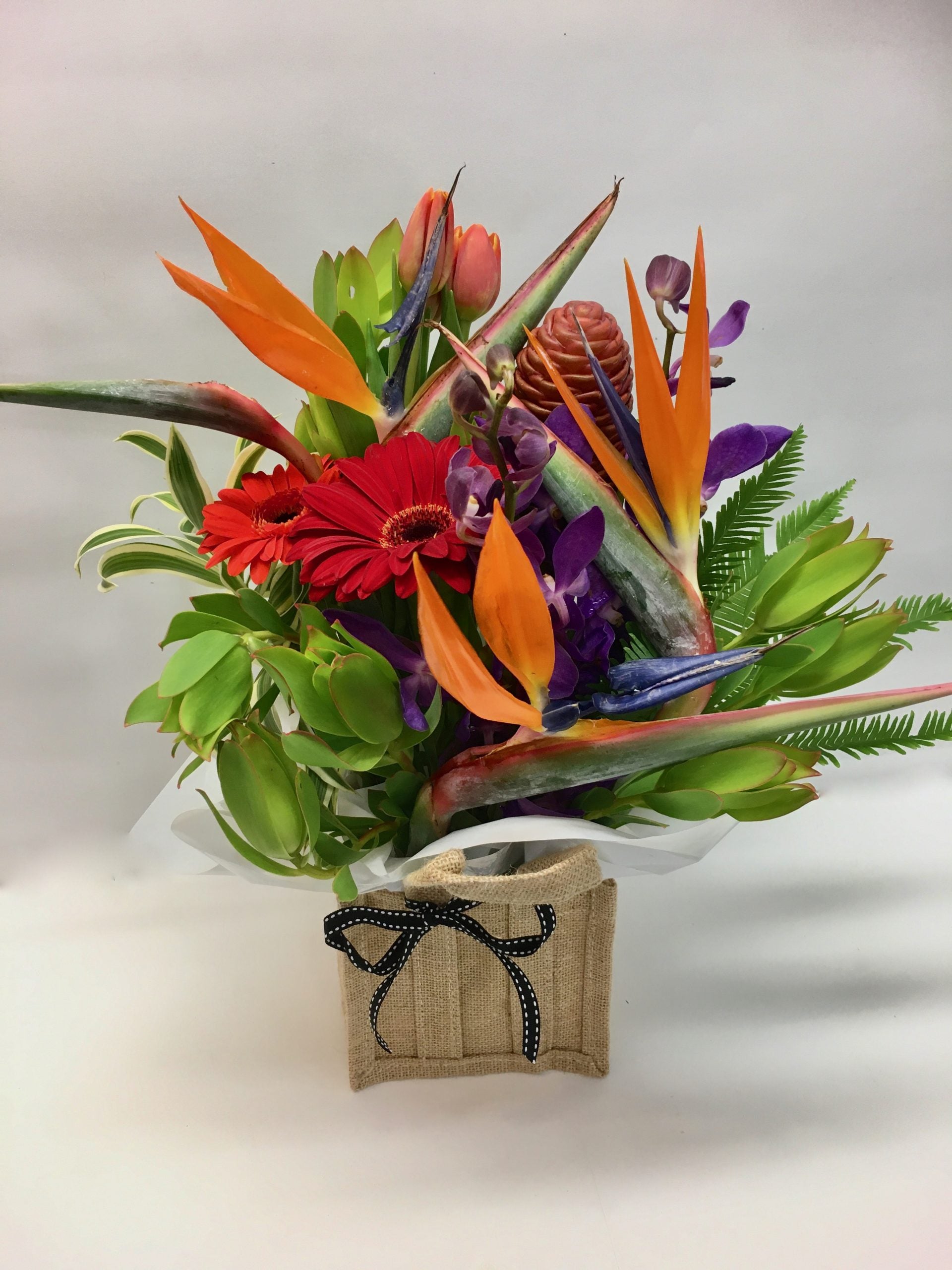 Bright hessian Bag flower arrangement for delivery on the Sunshine coast 
