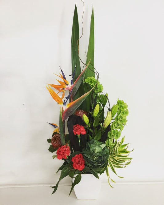 tall modern flower arrangement in bright colors  for delivery on the Sunshine coast 