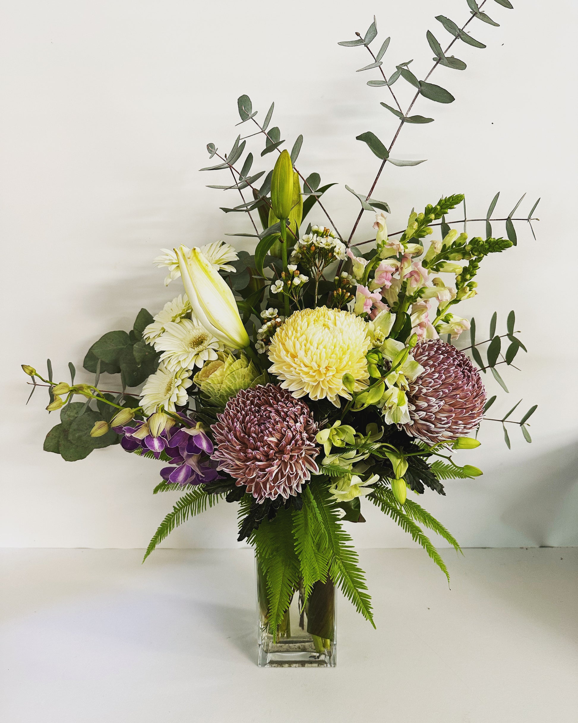 Vase of flowers in soft pastel tones for delivery on the Sunshine Coast 