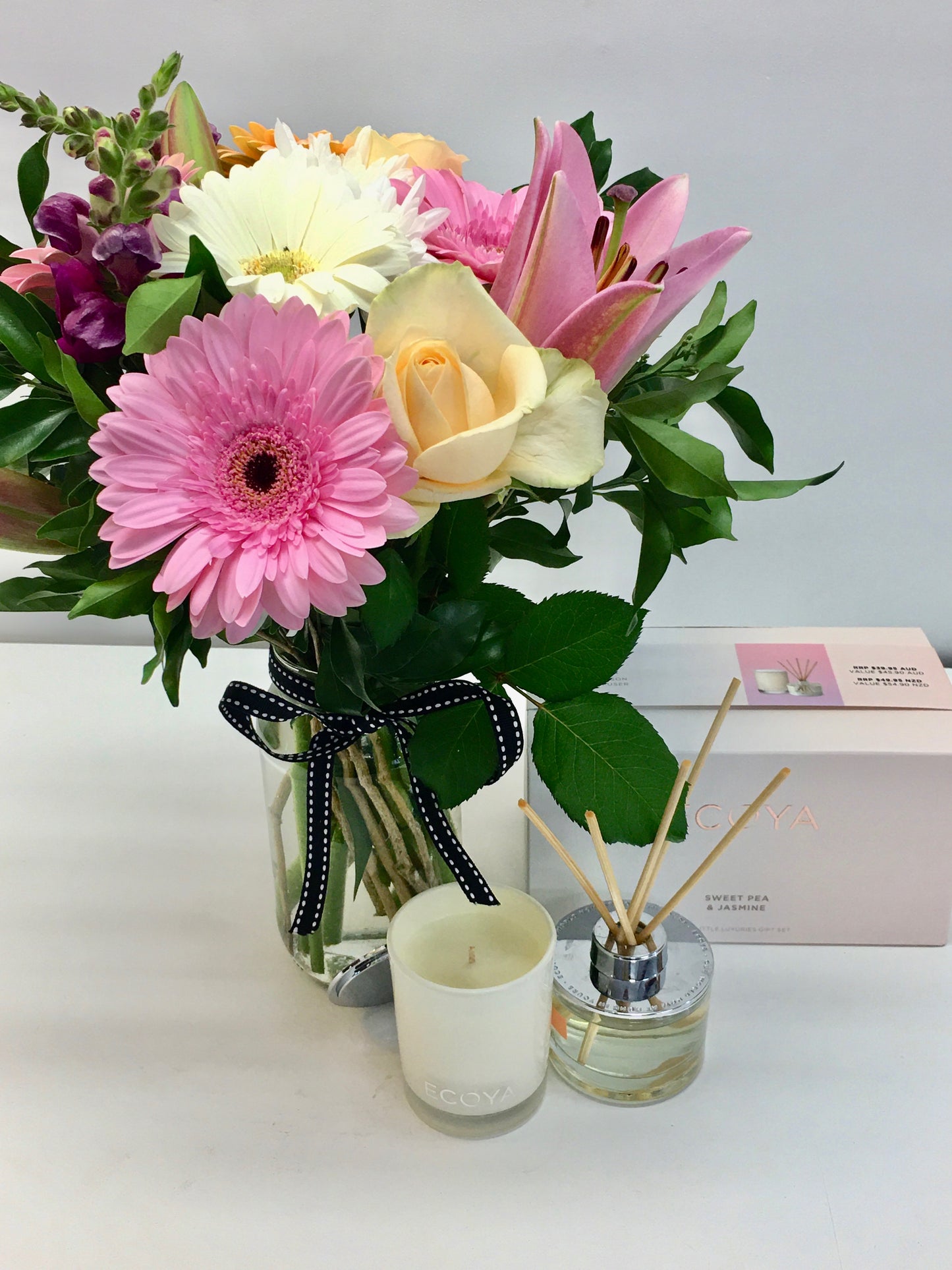 Flowers in a jar with gift pack including Candle and reed diffuser scented with sweet pea and jasmine 